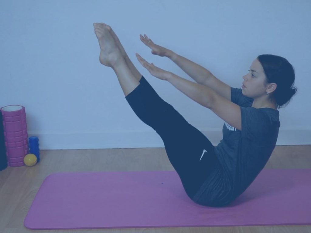 Pilates teacher performing the Teaser exercise from the Pilates Repertoire