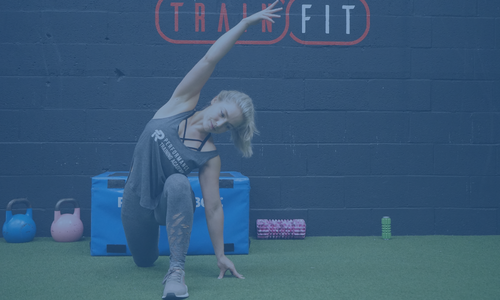 videos-image-student-dashboard performance training academy tutor performing a stretch exercise in a gym
